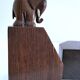 Pair of stylized elephant bookends in solid wood
