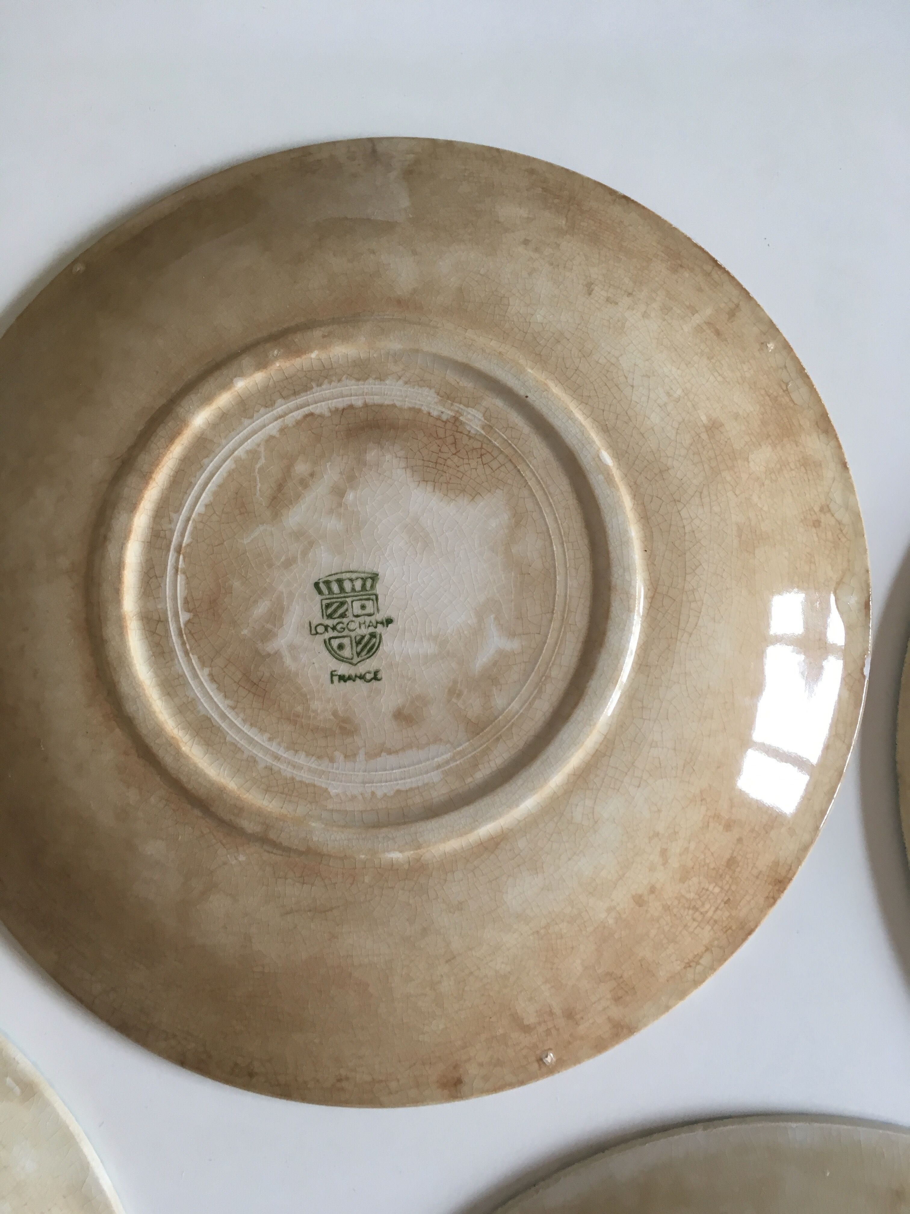 set of 6 flat plates in low-century 50's iron earth faience