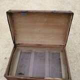 Malle de voyage ancienne bombee