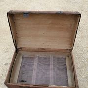 Old bombed travel trunk