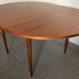 Scandinavian round teak dining table from the 60s extendable