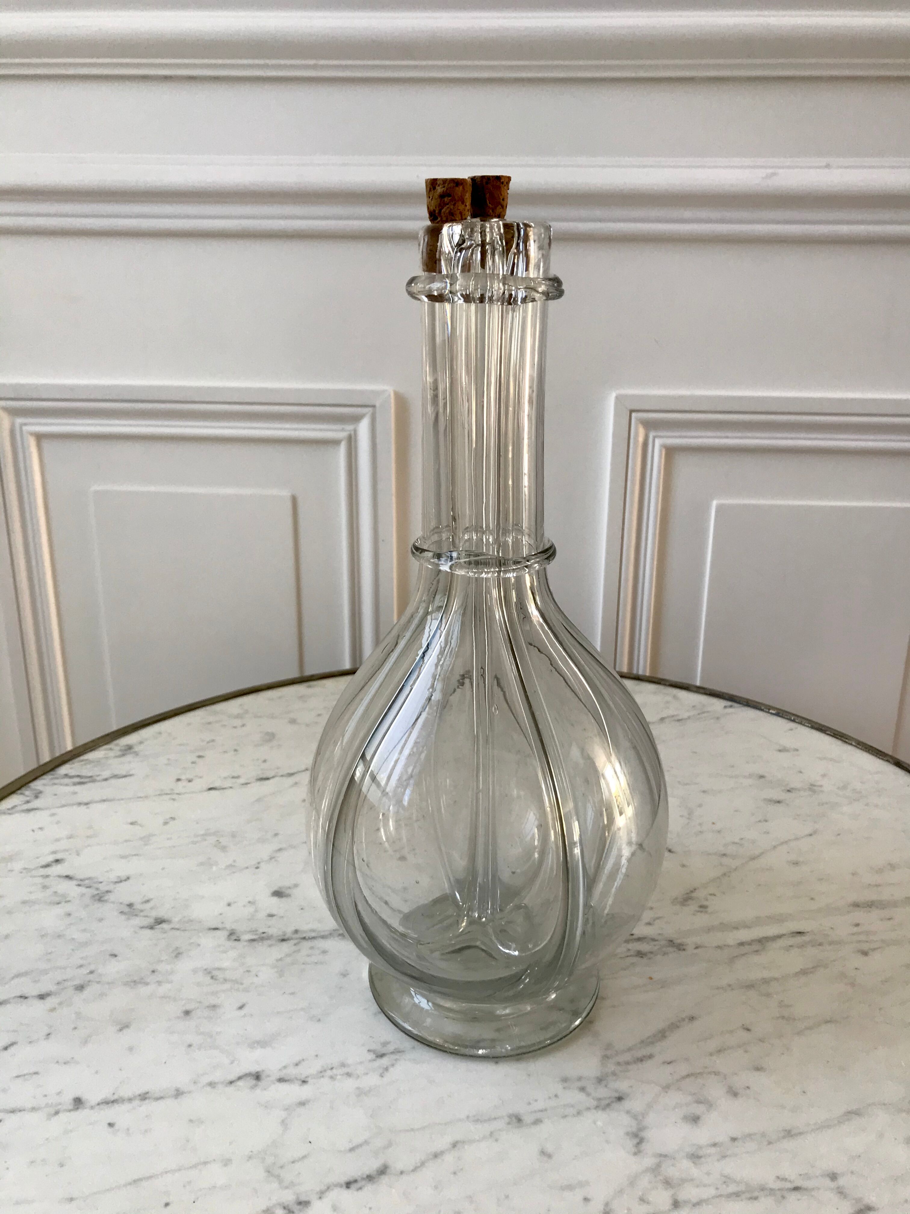 Liquor decanter with molded glass compartments early XXth