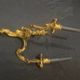 A pair of gilt bronze wall sconces in the chinese style - louis xv style