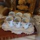 Antique Art Nouveau liqueur set in porcelain