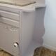 Vintage grey bedside table with marble top from the 1930s.