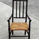 Fauteuil dit Bobbin en chêne teinté, 1930