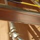 Gold metal wall coat rack