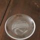 Hermès pair of glass plates with a dolphin pattern.