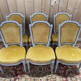Set of 6 Louis XVI style chairs with polished wood and velvet.