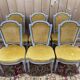 Set of 6 Louis XVI style chairs with polished wood and velvet.