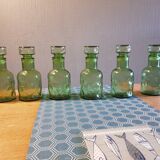 Lot of 8 vintage pharmacy bottles