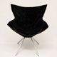 Vintage black velvet swivel lounge chair, sculptural butterfly shape.