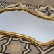 Batoque mirror in gilded wood 65 x 42 cm