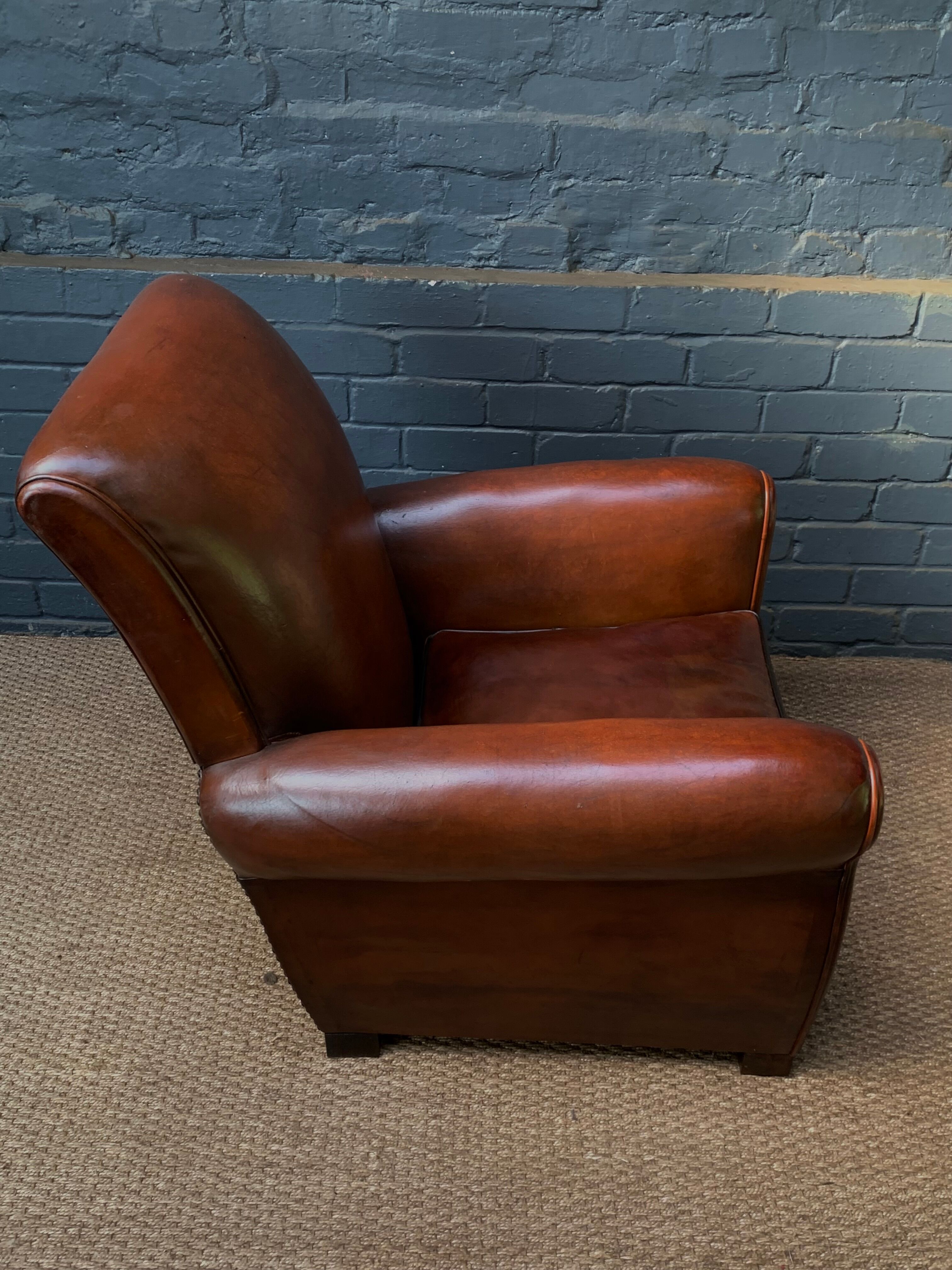 French, leather club chair, havana lounge model circa 1950's