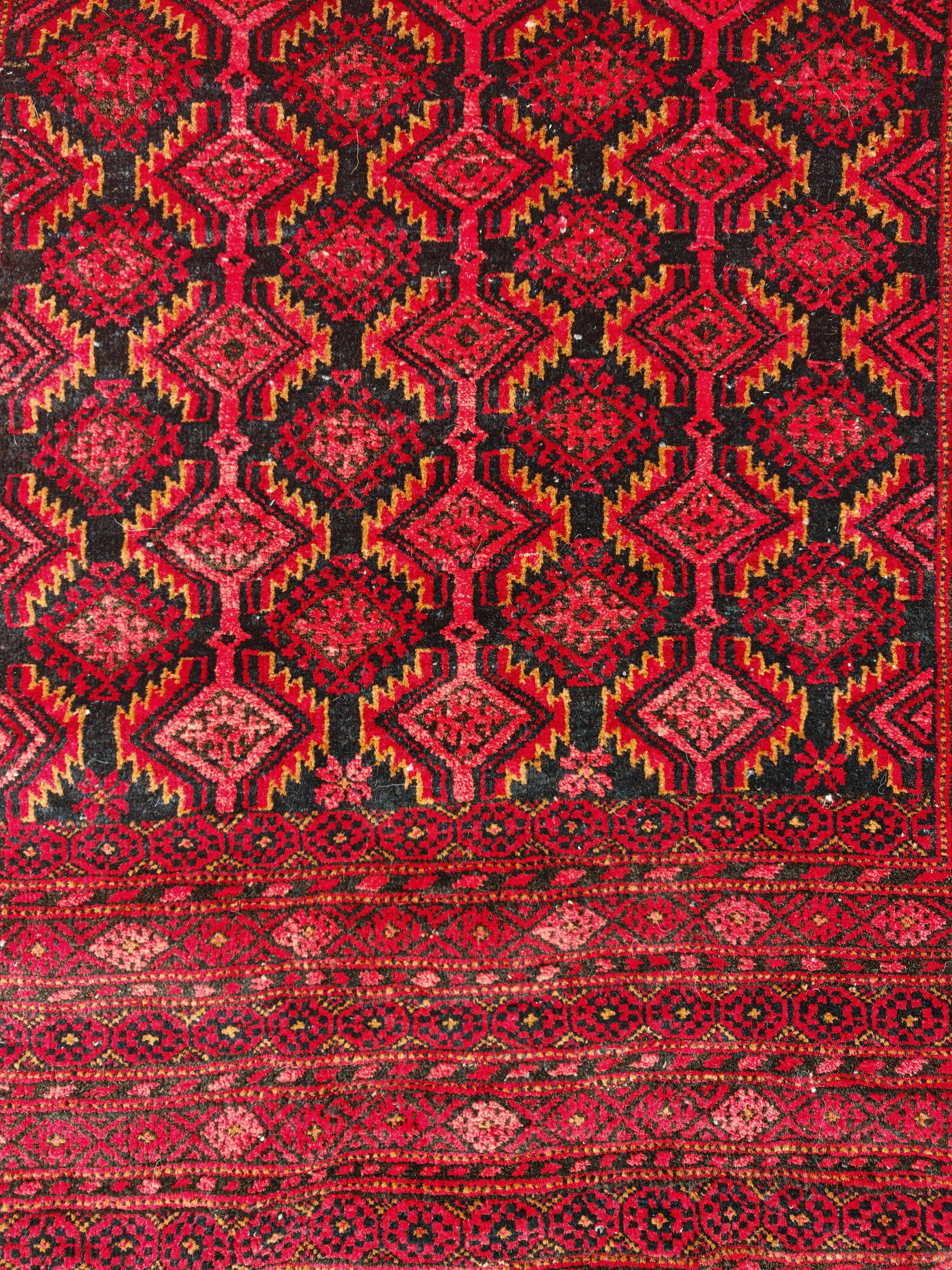 Vintage Baluch carpet handmade from natural wool, Afghanistan 1960.