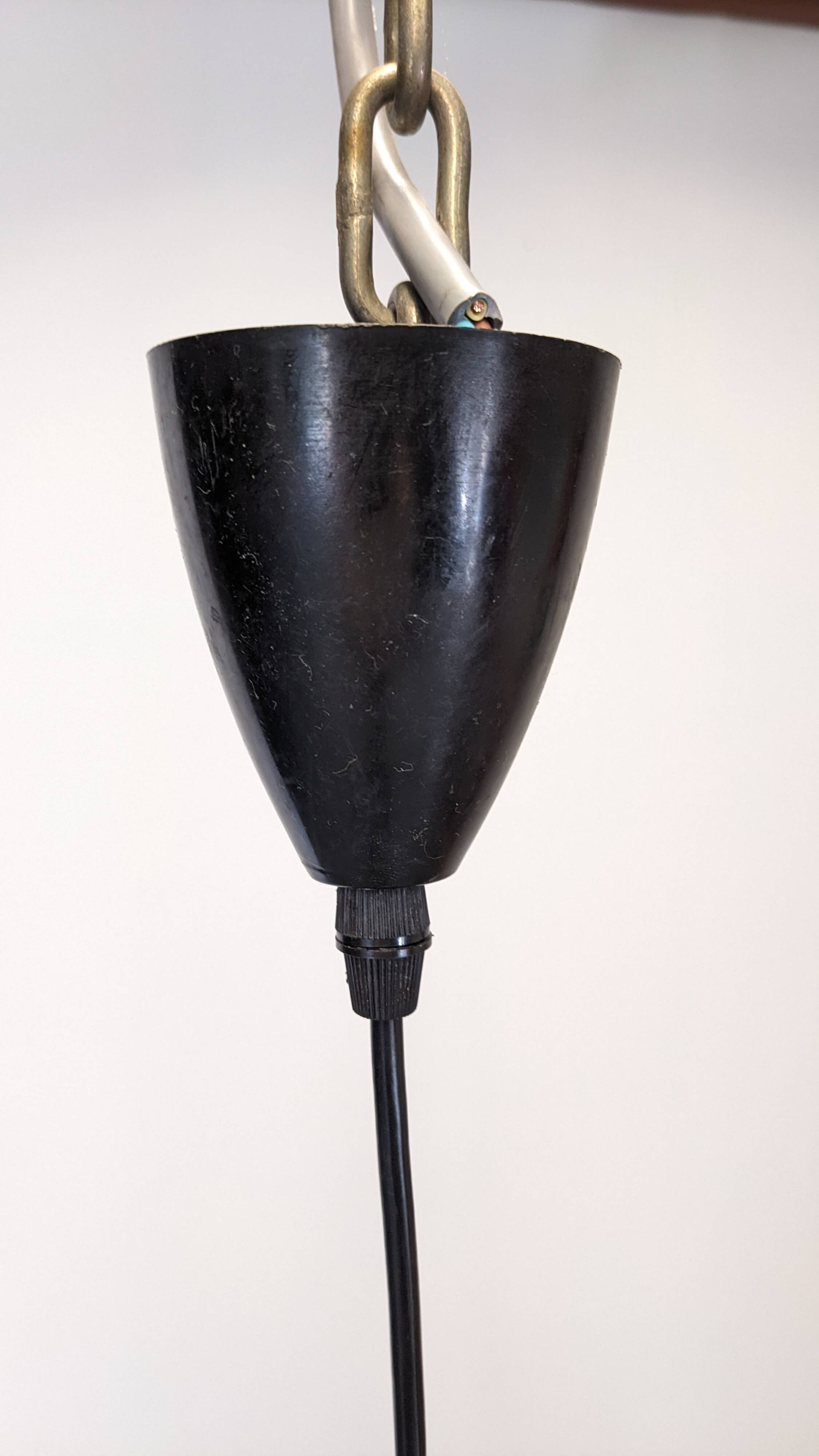 Art Deco style ball pendant light in gold glass