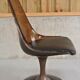 Four swivel chairs - metal base - smoked brown plexi shell - black skaï seat