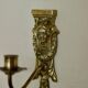Pair of mid-century Swedish brass face motif sconces
