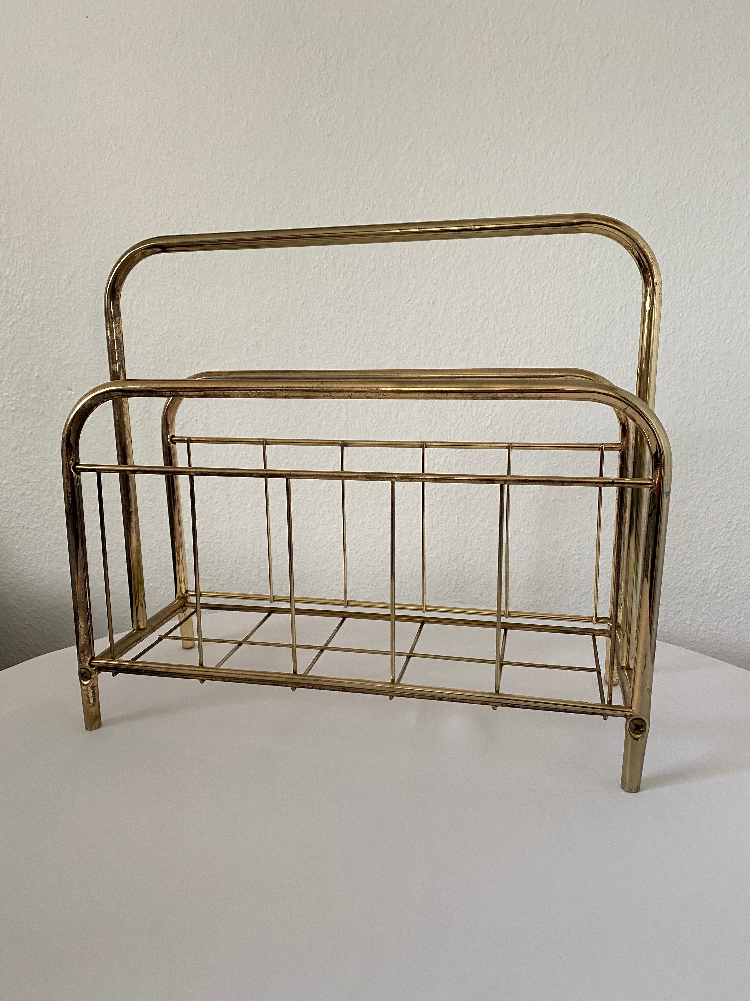 Gilded metal magazine door