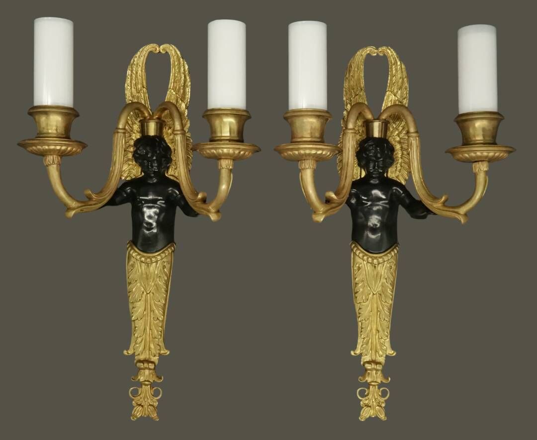 Pair of winged putti wall sconces in Louis XVI style - gilded bronze and black patina