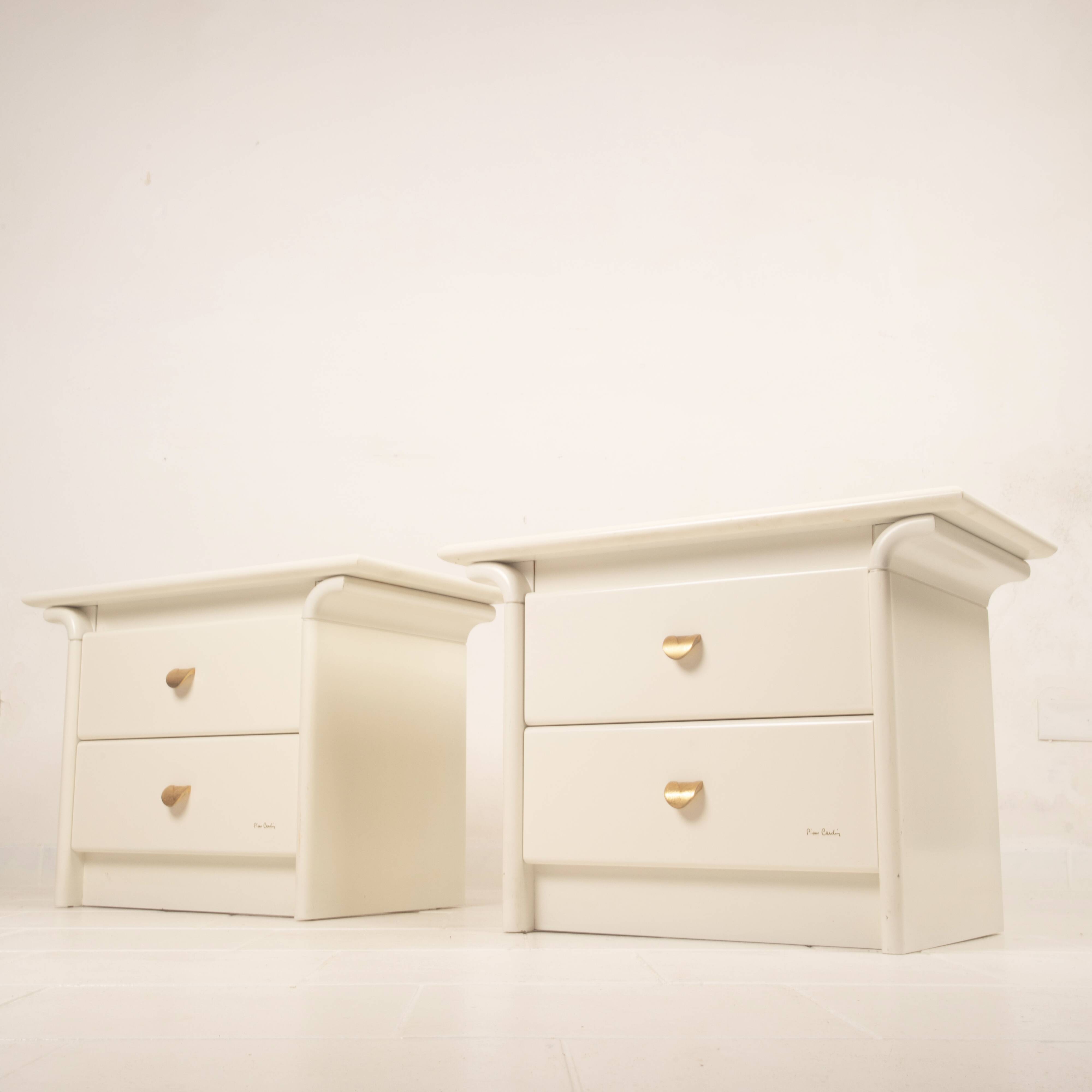 Pair of cream lacquered bedside tables by Pierre Cardin, 1980