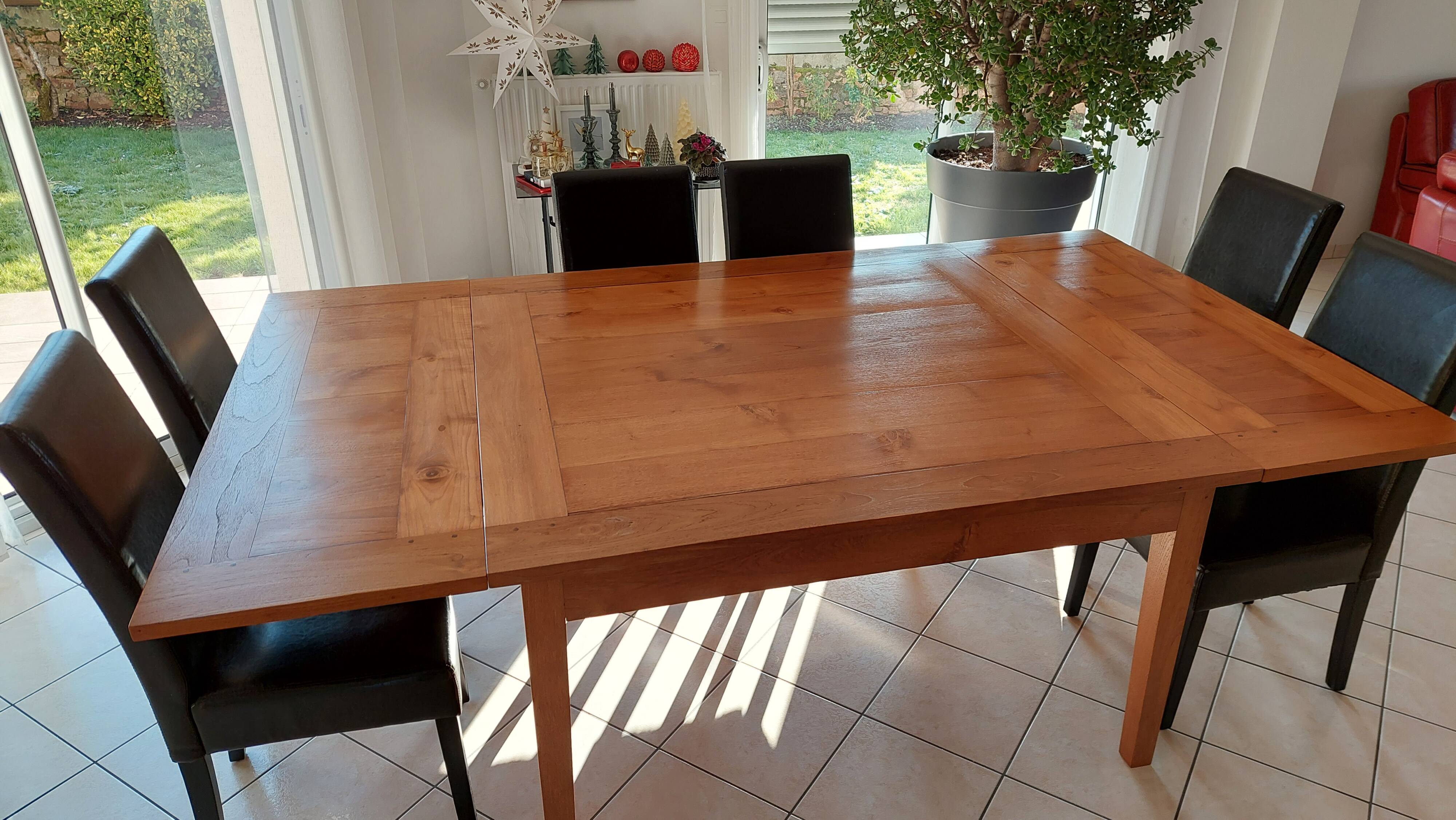 Extendable exotic wood table