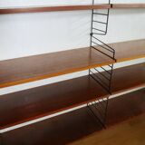 Modul Nisse teak string shelf with a vintage 60s design
