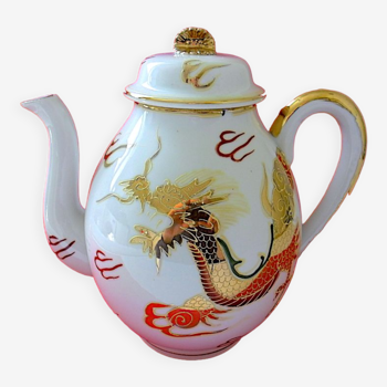 Japanese porcelain teapot decorated with a dragon