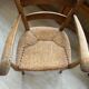 Fauteuil rustique en bois et paille