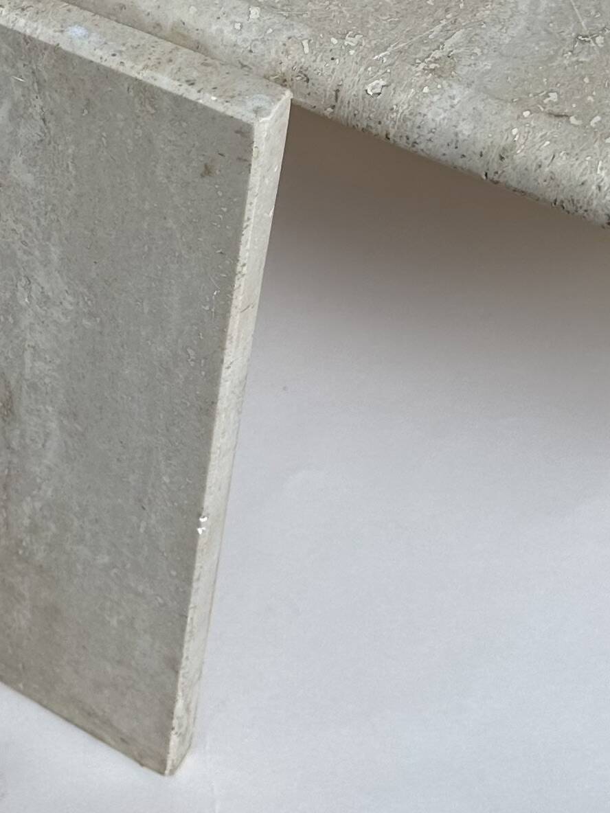 Travertine eye-shaped coffee table