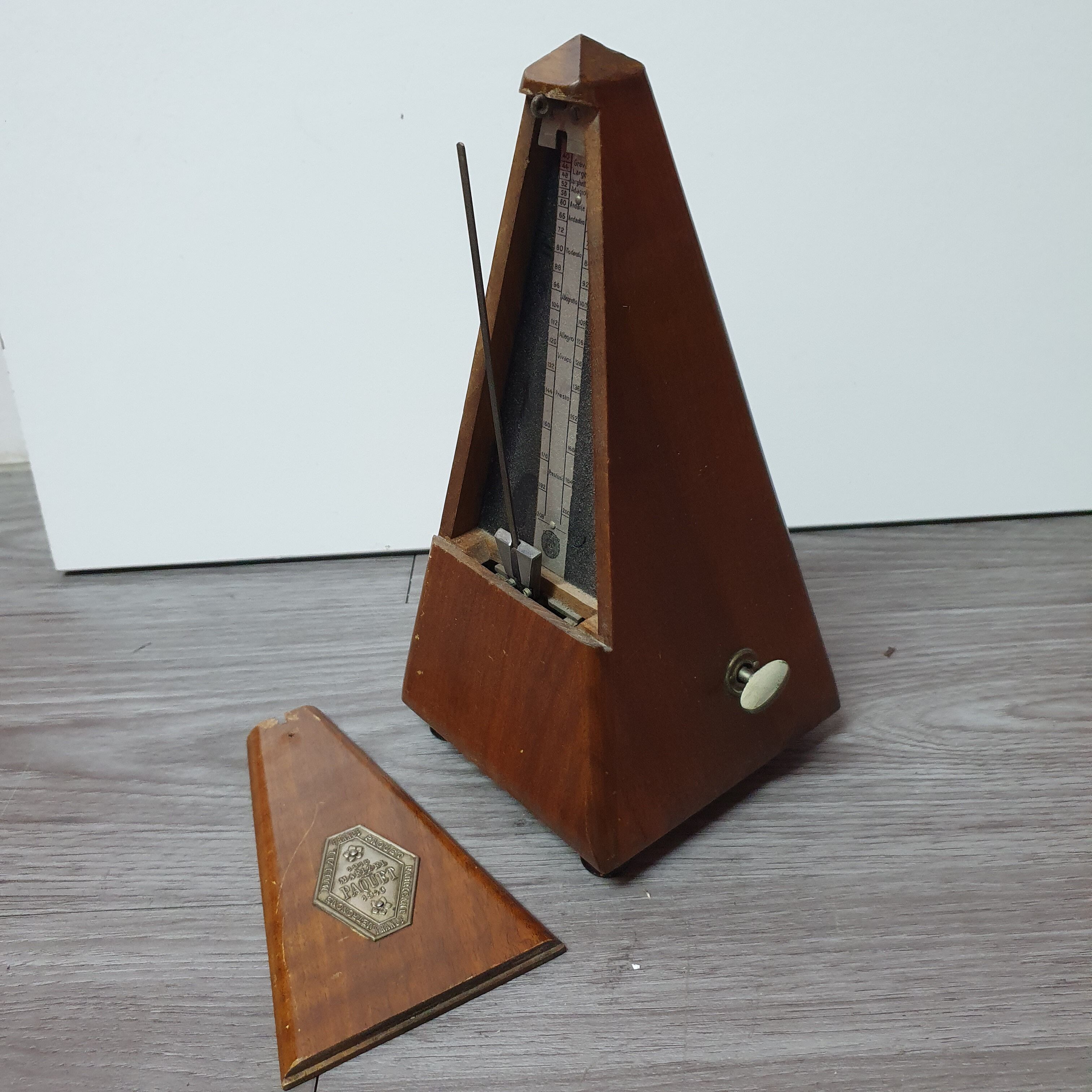 Old wooden metronome