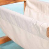 Bohemian magazine rack in vintage 70s pine style.