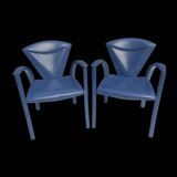 Armchairs covered in vintage blue leather