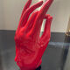 Vintage red ceramic hand paperweight