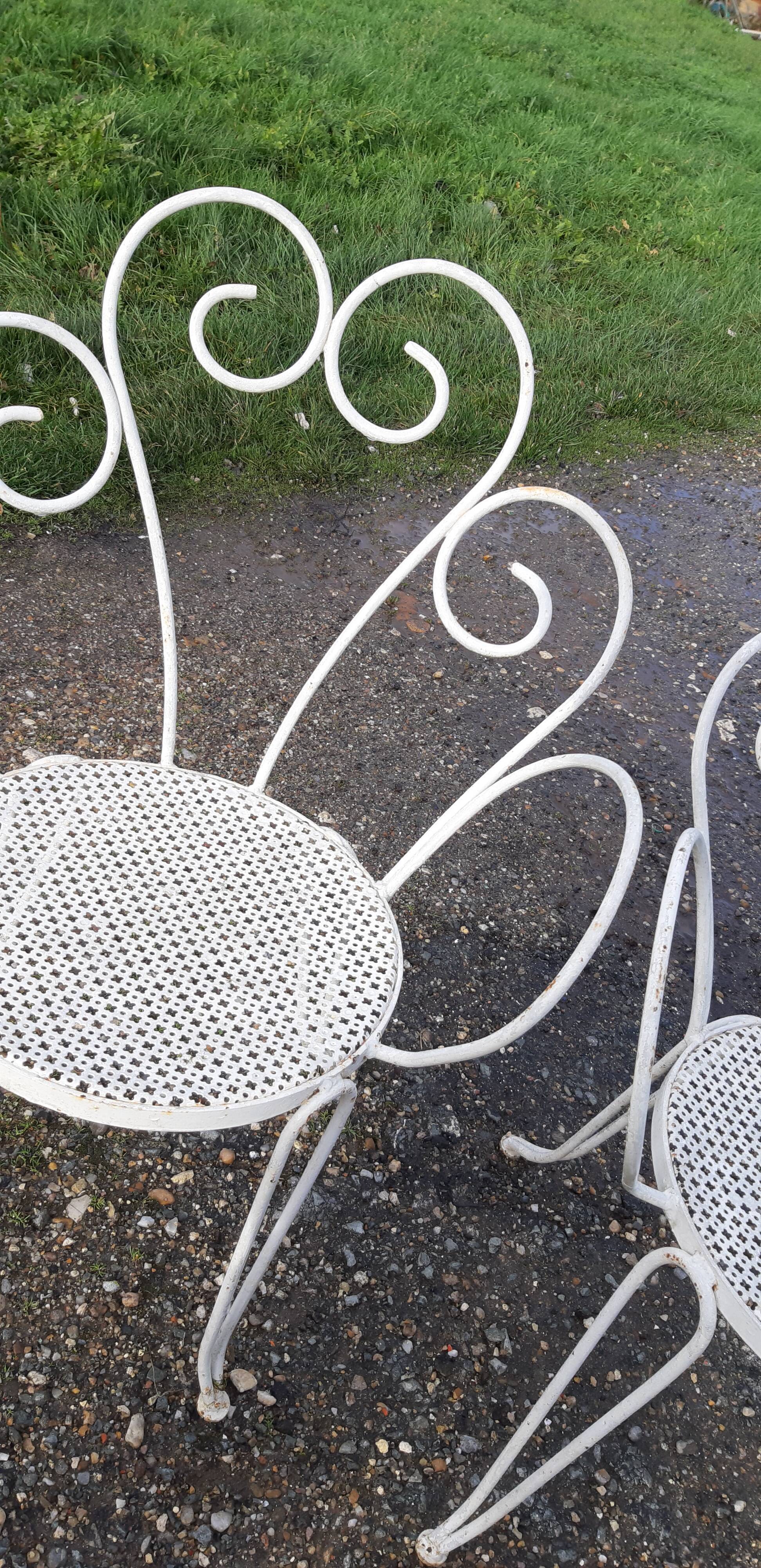 Paire de fauteuils de jardin 1900 en fer forgé