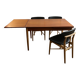 Table de salle à manger danoise. Teck massif avec détails en chêne. Fabriquée en 1960.