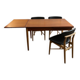 Danish dining table. Solid teak with oak details. Made in 1960.