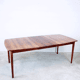 Extendable dining table in rosewood