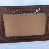 Miroir en tech ancien sculpté
