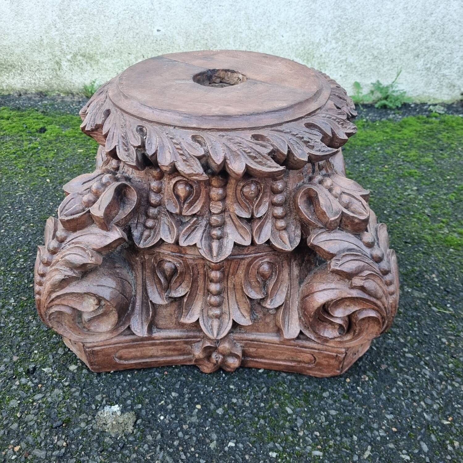 Coffee table with carved wooden base from India, glass top