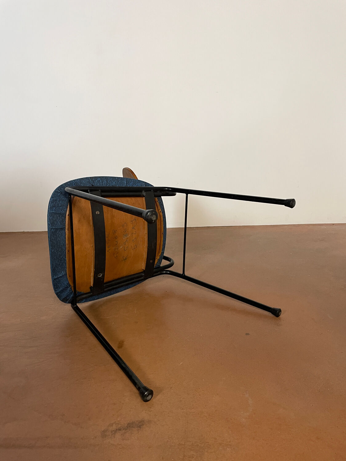 Wooden chairs and skaï