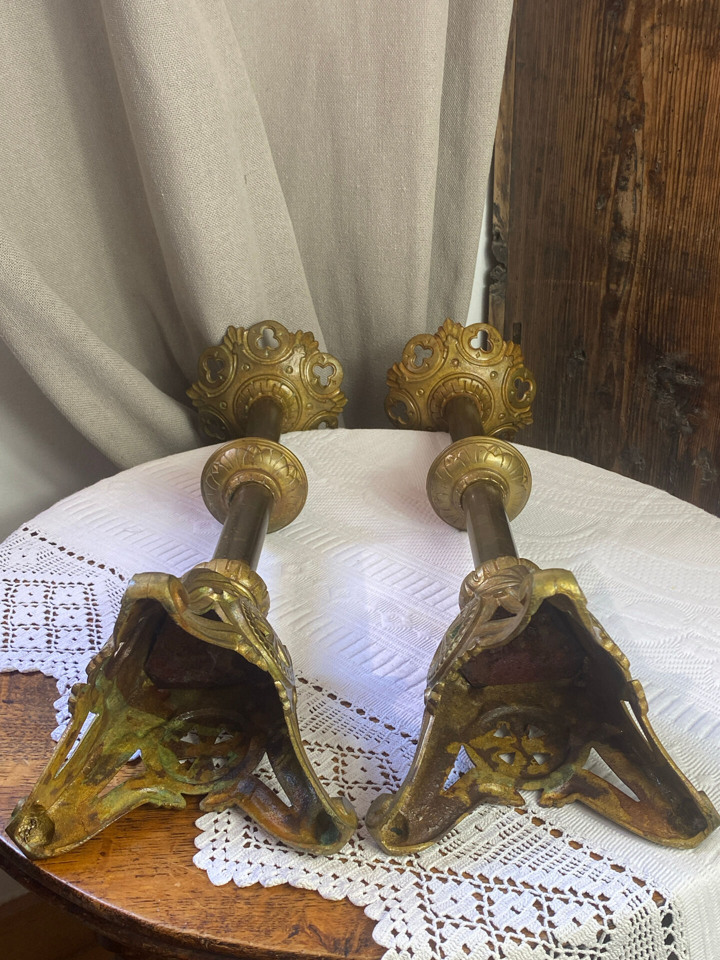 Pair of candlesticks in bronze and brass