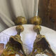 Pair of candlesticks in bronze and brass