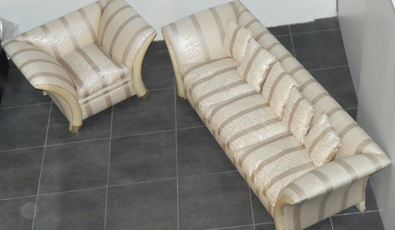 Sofa and armchair in colonial style with saber legs in resin, Italy, 1970s.