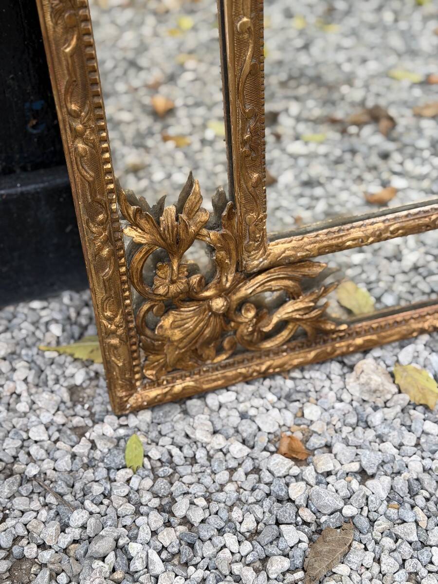 Regency style mirror in gilded wood, 19th century