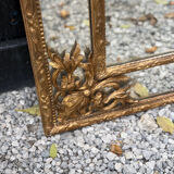 Regency style mirror in gilded wood, 19th century