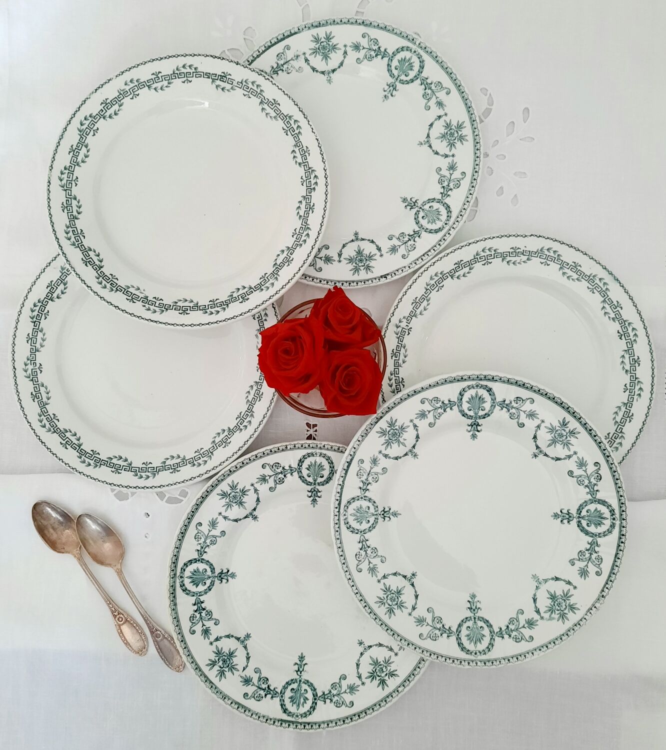 Old dessert plates mismatched in iron earth