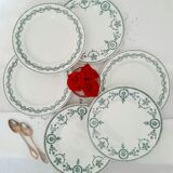 Old dessert plates mismatched in iron earth