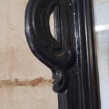 Mirror with carved wooden pediment, late 19th century