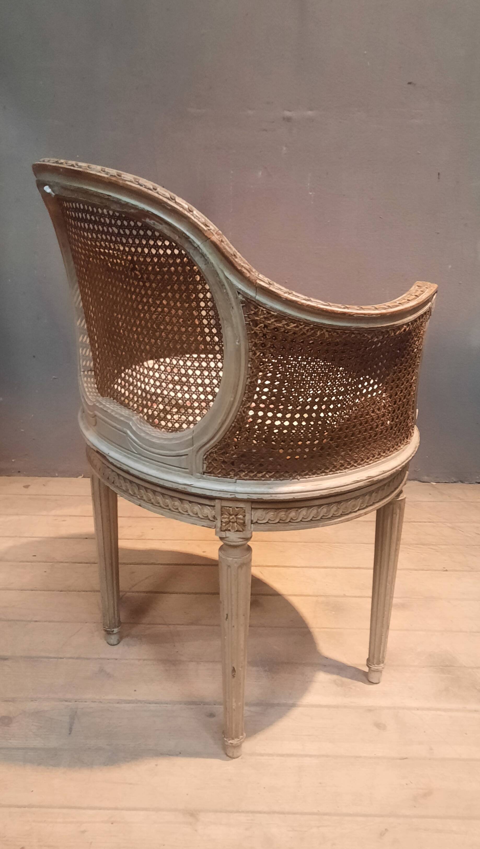 Caned armchair in Louis XVI style